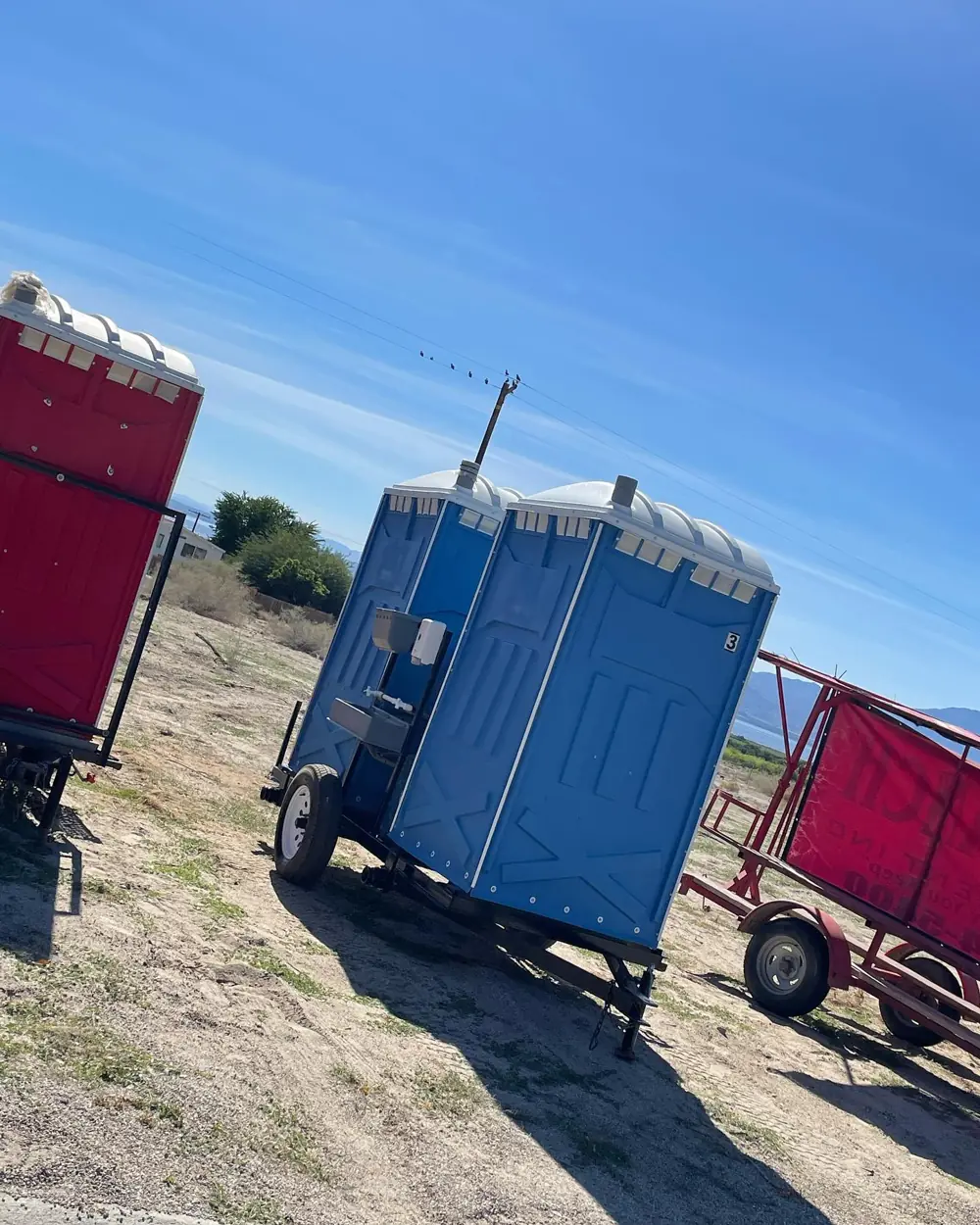 Porta potty setup of the kind we deliver to Edna, Texas